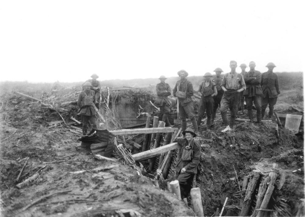 Men of the 10th Machine Gun Company by a German pillbox at Uhlan Trench, Messines Ridge. 